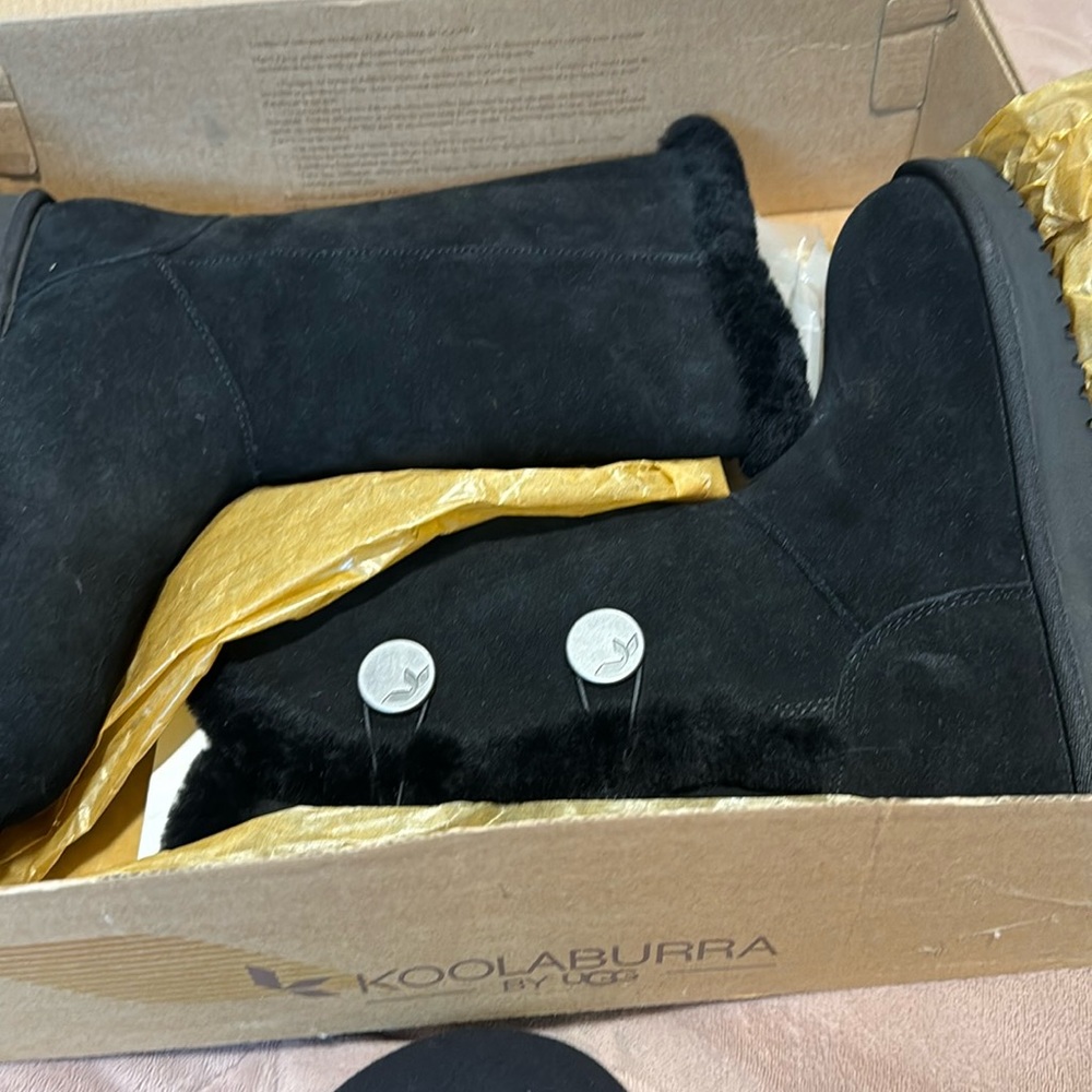 Brand new tall uggs sise 7